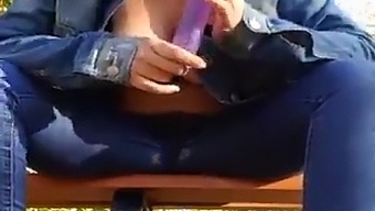 A Good Girl Sucks Her Dildo And Fucks Her Pussy On The Bench In The Public Garden