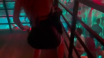 Aroused Blonde In The Midst Of A Nightclub